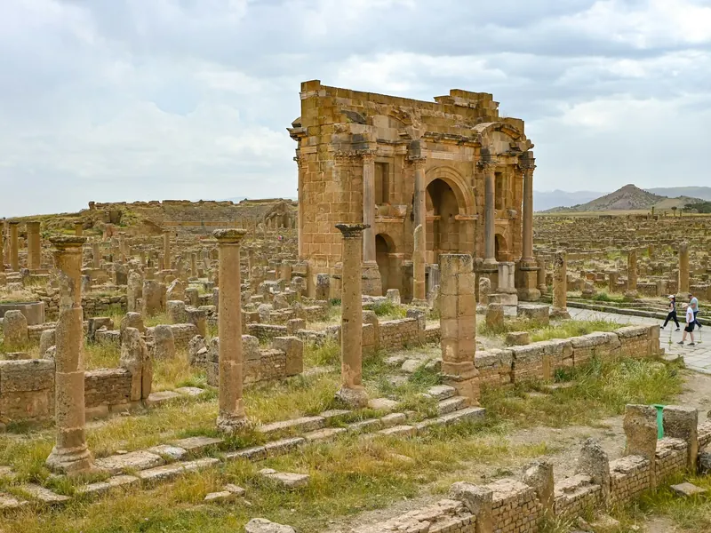 The Arch of Trajan among the ruins of Timgad